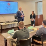 Oneida County Director of Health Dan Gilmore and Montgomery County Public & Mental Health Director Sara Boerenko address Oneida County Health Department employees during a Mental Health First Aid training session at the Oneida County Office Building in Utica on June 6, 2023.
