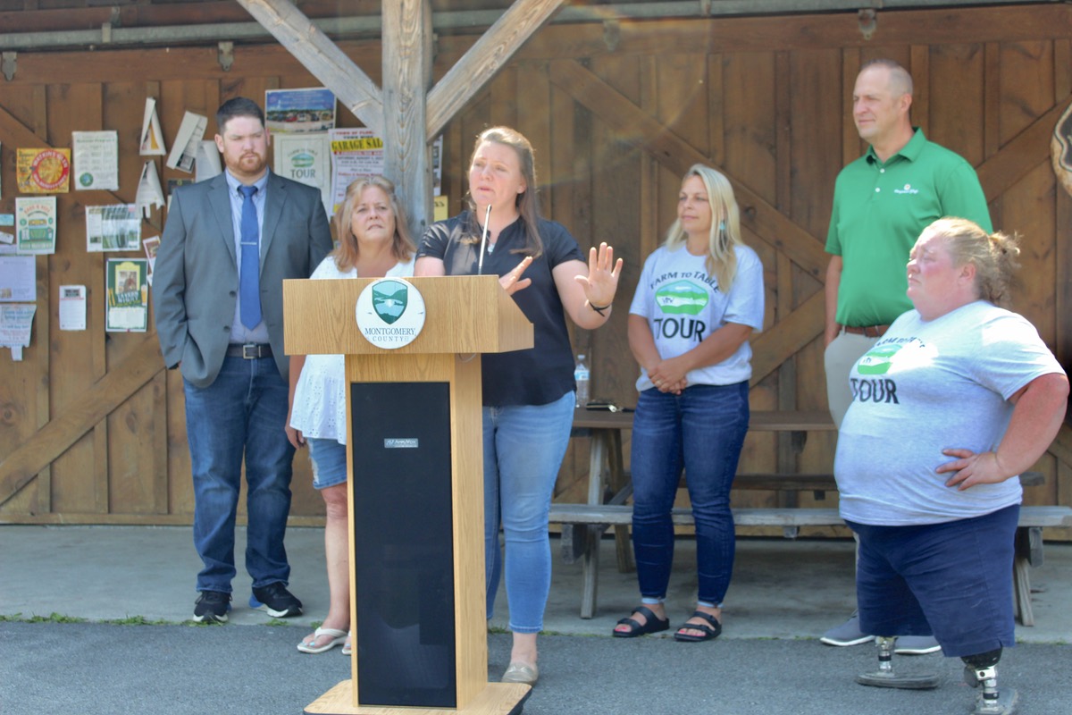 Amy Hoefele of Appleridge Farm in Fonda speaks today at Karen’s Produce during a press conference kicking-off the Farm to Table Tour and Harvest Connection program.