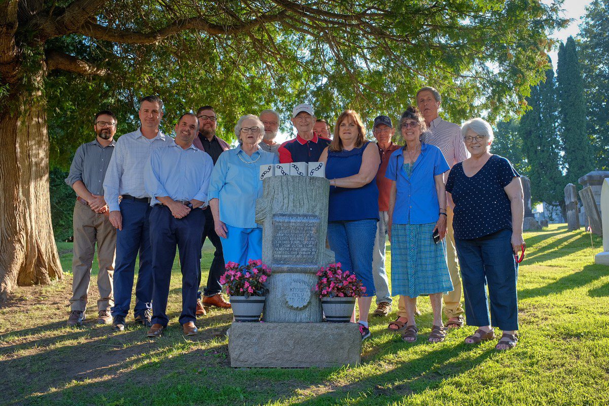 From left to right: City Engineer Chet Szymanski, 2nd Ward Alderman and Common Council President Justin Welyczko, Dan Enea of Mohawk Valley Funerals and Cremations, 1st Ward Alderman Tim Lyon, Joan Vogt, 1st Ward Alderman Jonathon Shaffer, Louis Baum, Church Street Cemetery Caretaker Justin Ostasz, Patty Sklarz, David Krutz, Pat Frezza-Gressler, Jeffrey Gressler, and Pat Stock.