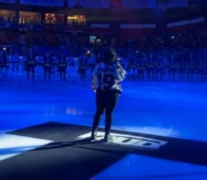2023, Natalie Figueroa at the Utica University Nexus Center hockey game, singing The National Anthem. Photo provided by Natalie Figueroa.