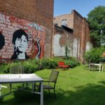 Castiglione Memorial Park, located on North Main Street, features a giant mural dedicated to reading and books. Photo courtesy of DowntownGloversvile.org.