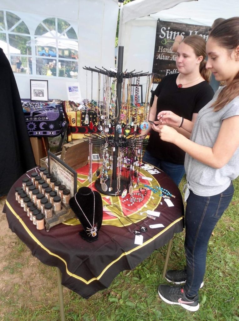 Photo of a pop-up shop of Julie's Cauldron at the 2016 CNY Pagan Pride Day in Liverpool, NY. Photo provided by Juelz Cullen.