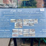 Little Falls Buildings And Streets .. etc. sign located near the intersection of Main and South Ann Streets.