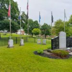 Long view of Agent Orange Commemorative Monument with other veterans' monuments.