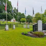 Long view of Agent Orange Commemorative Monument with other veterans' monuments.