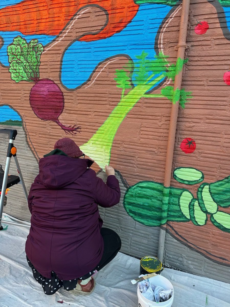 Carin Kent, The Caring Creator’s work at the Stone Soup American Bistro Mural with The Art Thing Collaborative
