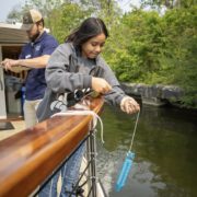 Students study water quality while on a field trip aboard the Riverie in Rochester. Erie Canalway National Heritage Corridor will expand the number of students taking field trips thanks to a grant from the National Park Foundation. Photo courtesy of the Erie Canalway National Heritage Corridor.
