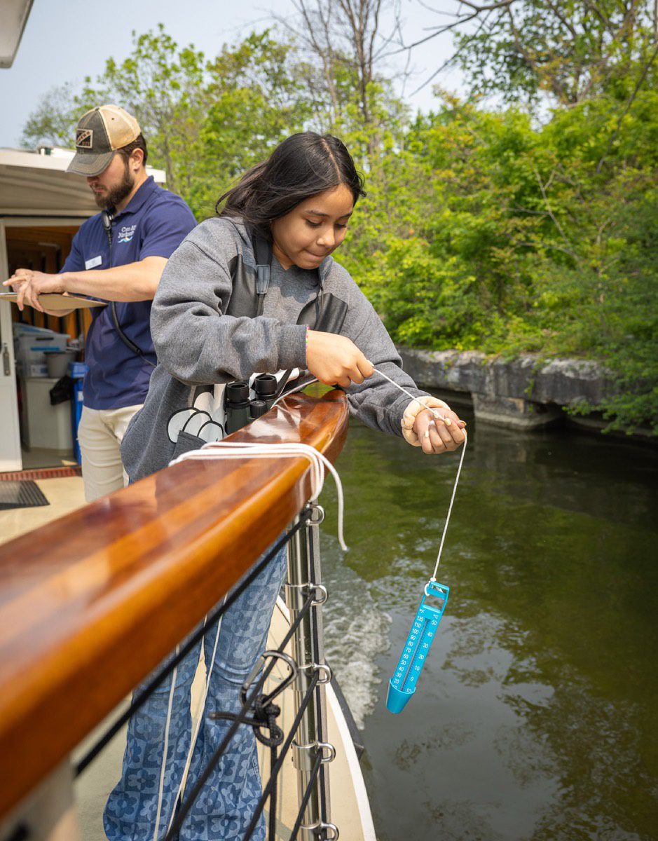 Students study water quality while on a field trip aboard the Riverie in Rochester. Erie Canalway National Heritage Corridor will expand the number of students taking field trips thanks to a grant from the National Park Foundation. Photo courtesy of the Erie Canalway National Heritage Corridor.