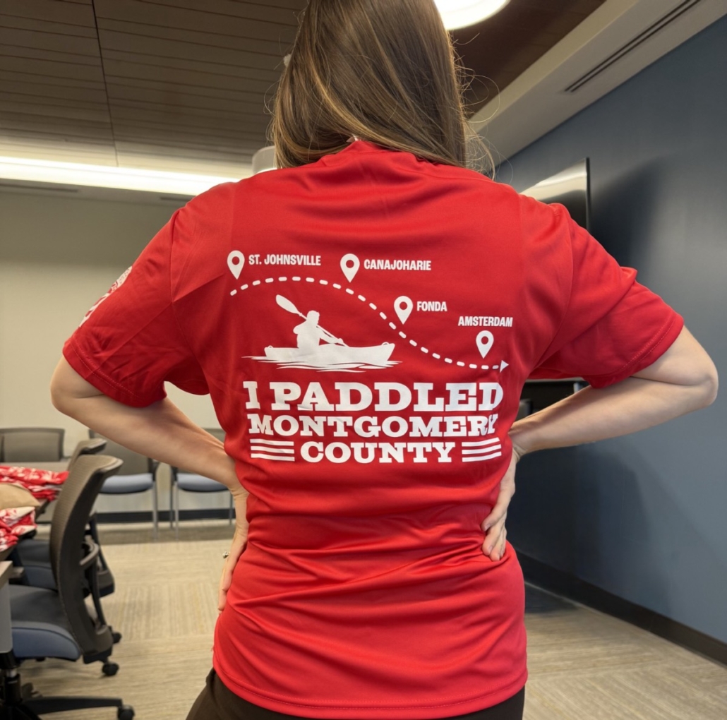 An example of the commemorative shirt that will be awarded to paddlers who have completed all of the Montgomery County Kayak-a-Thon routes, covering the length of the Mohawk River featured throughout the event series in Montgomery County. An example of the commemorative shirt that will be awarded to paddlers who have completed all of the Montgomery County Kayak-a-Thon routes, covering the length of the Mohawk River featured throughout the event series in Montgomery County.